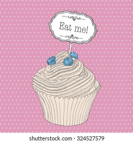 Hand drawn cupcake with blueberry and chalkboard Eat me! Vector pastry shop element.