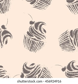 Hand drawn cupcakes, seamless pattern, brown cupcakes with whipped cream and cherry on beige bacground
