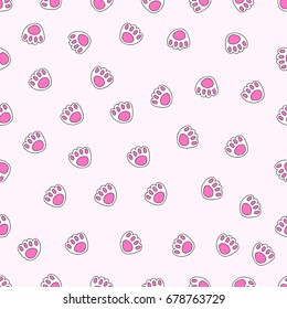 Hand drawn cute cartoon pink paw seamless doodle pattern