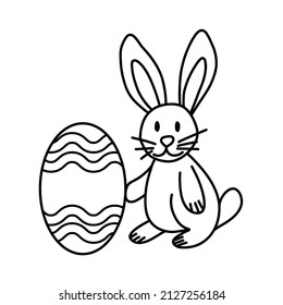 Hand drawn cute easter rabbit with egg. Black and white.  Vector illustration in doodle style on white background