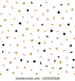 Hand drawn cute pink hearts confetti abstract seamless pattern. Rustic, boho simple colorful background. Cartoon illustration