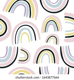 Hand drawn cute rainbow seamless pattern. Rainbow print for baby textiles, fabrics and baby shower cards.