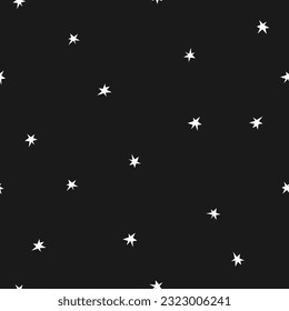 Hand drawn cute seamless pattern with stars. Flat vector night sky abstract print in  doodle style. Universe, cosmos inside. Repeated galaxy background, wrapping or wallpaper.