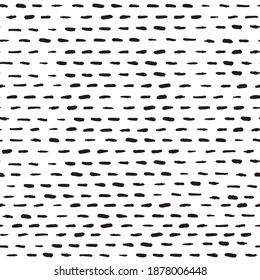 Hand drawn dashed line vector seamless pattern. Black brush strokes. Monochrome hand drawn stripes. 