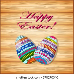 Hand drawn  decorated egg on the wood background. Image for easter card. Vector illustration - eps 10.