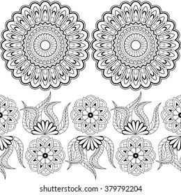 Hand drawn decorated seamless pattern with flowers and mandalas.  Vector illustration - eps 10.