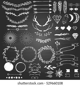 Hand drawn decoration elements on the blackboard. Hipster style sketch set foe design.