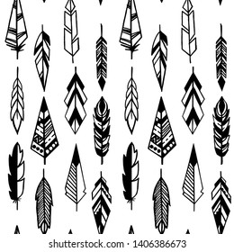 Hand drawn decorative Boho ornamental feathers. Vector seamless pattern.