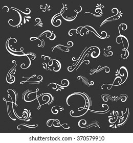 Hand drawn decorative floral curls and swirls collection. Vintage vector design elements. Ink illustration.