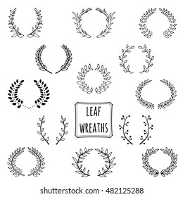 Hand drawn decorative floral wreath made in vector. Unique collection of wreath and branches.