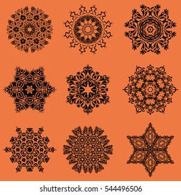 Hand drawn design with abstract winter doodles. Vector Merry Christmas and Happy New Year lettering quote. 9 snowflakes set on a orange background.