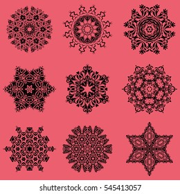 Hand drawn design with abstract winter doodles. Vector Merry Christmas and Happy New Year lettering quote. 9 snowflakes set on a pink background.