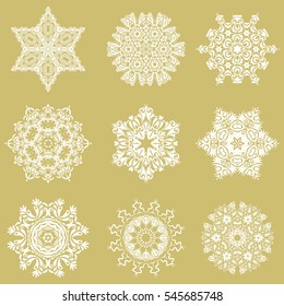 Hand drawn design with abstract winter doodles. Vector Merry Christmas and Happy New Year lettering quote. 9 snowflakes set on a neutral background.