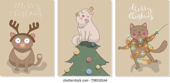 Hand drawn design for your holiday cards.Lovely cats and a calligraphy Merry Christmas