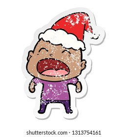 hand drawn distressed sticker cartoon of a shouting bald man wearing santa hat