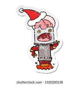 hand drawn distressed sticker cartoon of a robot wearing santa hat