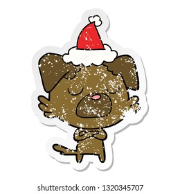 hand drawn distressed sticker cartoon of a dog wearing santa hat