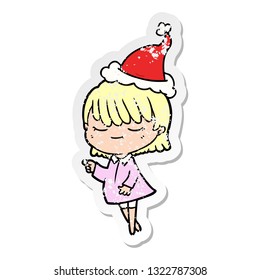 hand drawn distressed sticker cartoon of a woman wearing santa hat