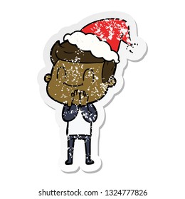 hand drawn distressed sticker cartoon of a friendly man wearing santa hat