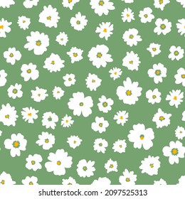 Hand drawn ditsy daisy seamless repeat pattern on fresh green background, Random placed, vector meadow flowers allover surface print.