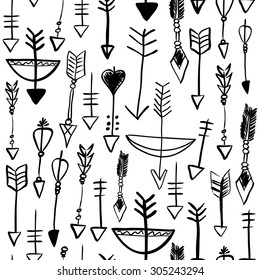 Hand drawn doodle arrows and bows seamless pattern. Colored vector illustration for wallpaper design, covers, fabric