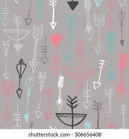 Hand drawn doodle arrows and bows seamless pattern. Colored vector illustration for wallpaper design, covers, fabric