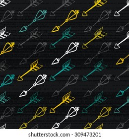 Hand drawn doodle arrows seamless pattern. Colored vector illustration for wallpaper design, covers, fabric