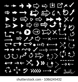 Hand Drawn Doodle Arrows Set on a Black Background Pencil Sketch White Handwritten Cartoon Illustration