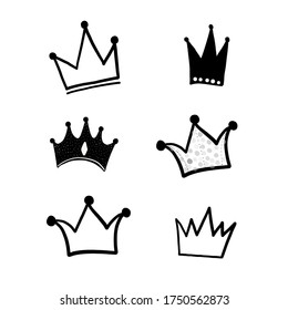 Hand drawn doodle black crown vector illustration set