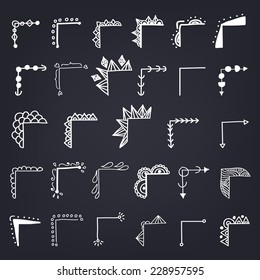 Hand Drawn Doodle Book Corners on Black Chalkboard Background
