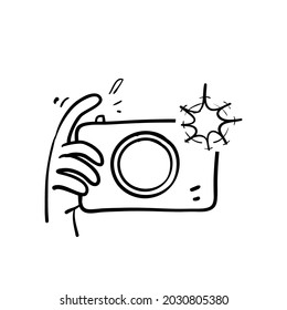 hand drawn doodle camera and  flash light icon illustration vector isolated