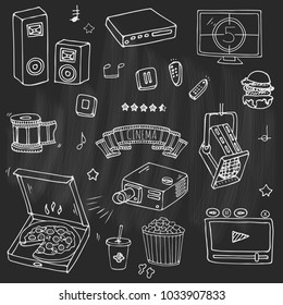 Hand drawn doodle Cinema set. Vector illustration. Movie making icons. Film symbols collection. Cinematography freehand elements: camera, film tape, photo camera, pizza, popcorn, projector, microphone