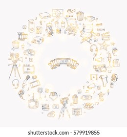 Hand drawn doodle Cinema set. Vector illustration. Movie making icons. Film symbols collection. Cinematography freehand elements: camera, film tape, photo camera, pizza, popcorn, projector, microphone