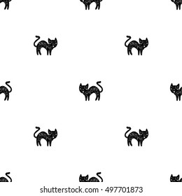 Hand drawn doodle cute halloween cat vector seamless pattern for cards, wrapping, decoration and textile