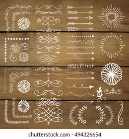 Hand Drawn Doodle Design Elements. Rustic Decorative Line Borders, Dividers, Arrows, Swirls, Scrolls, Ribbons, Banners, Frames, Corners Objects on Wooden Background Texture Vector Illustration