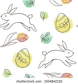 Hand drawn doodle Easter seamless pattern with rabbit, eggs and tulips on a white background