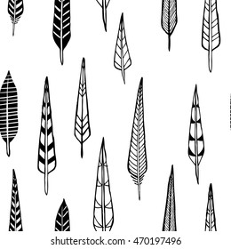 Hand drawn doodle feathers. Seamless pattern.