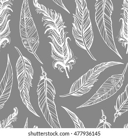 Hand drawn doodle feathers seamless pattern