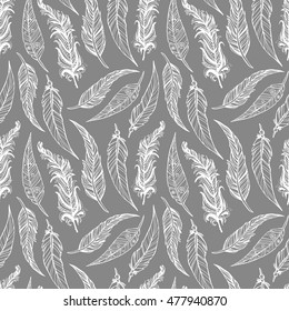 Hand drawn doodle feathers seamless pattern