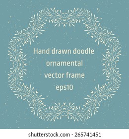 Hand drawn doodle floral ornamental vector frame