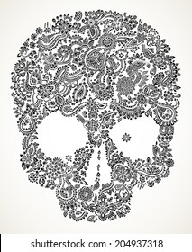 Hand drawn doodle floral skull in black over white.