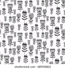 Hand drawn doodle flowers black and white seamless vector pattern