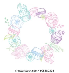 Hand drawn doodle frame with flowers, cupcakes and macaroons.