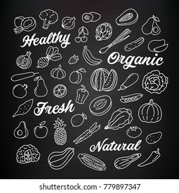 Hand drawn doodle fruits and vegetables icons, vector illustration on the chalkboard background.