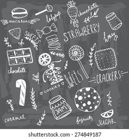 Hand drawn doodle  grungy colored sweets with a chalkboard background