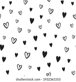 Hand drawn doodle hearts seamless pattern. Valentine's day heart illustrations texture background.