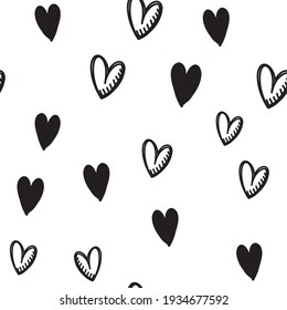 Hand drawn doodle hearts seamless pattern. Valentine's day heart illustrations texture background.