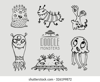 Hand drawn doodle monsters. Vector illustration.