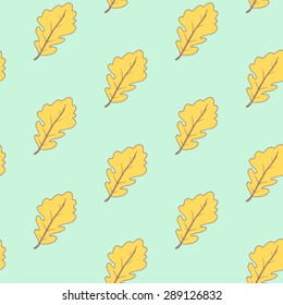 Hand drawn doodle oak leaves background. Colorful useful pattern for wallpaper, scrapbooking, notebook covers. Seamless pattern.