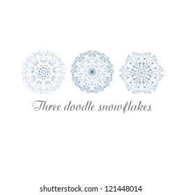 Hand drawn doodle ornamental snowflakes.